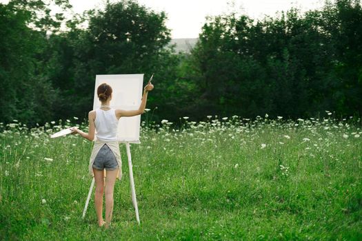 woman artist drawing nature picnic hobby creative. High quality photo