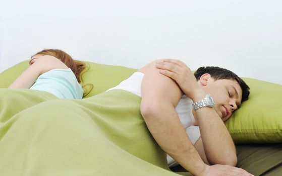 happy young couple in bed at morning