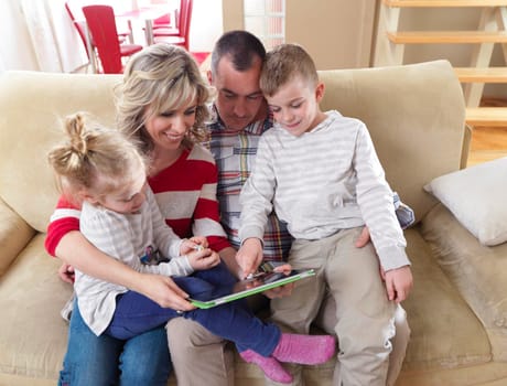 hapy young family have fun  with their children at modern living room home indoors