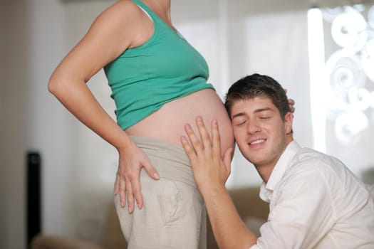 happy young cuple, pregnant woman