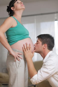 happy young cuple, pregnant woman