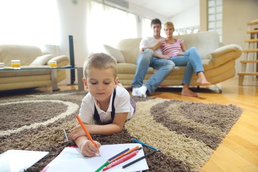 happy young family with kids in bright modern living room have fun and looking big flat lcd tv