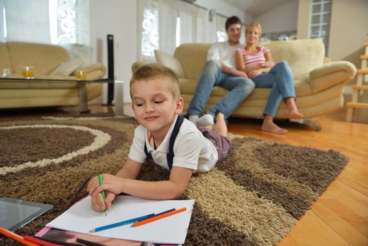 happy young family with kids in bright modern living room have fun and looking big flat lcd tv