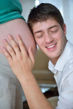 happy young cuple, pregnant woman