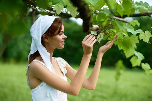 Woman in white dress countryside village nature ecology. High quality photo