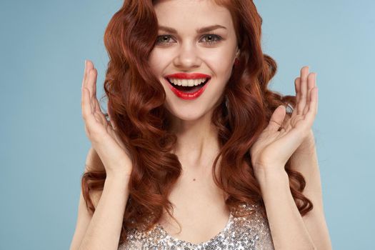 attractive red-haired woman red lips face close up. High quality photo