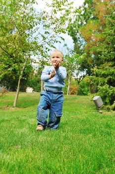 beautiful children  posing in fashionable clothing outdoor