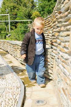 beautiful children  posing in fashionable clothing outdoor