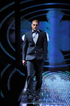 handsome man male model at fashion show stage event
