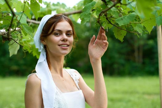 Woman in white dress countryside village nature ecology. High quality photo