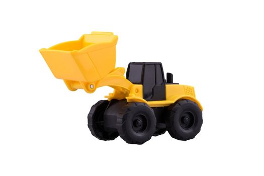 Heavy duty construction Tractor toy isolated with clipping path on white background.