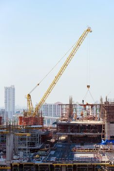 Construction site busy operate in beginning of building new complex infrastructure project.