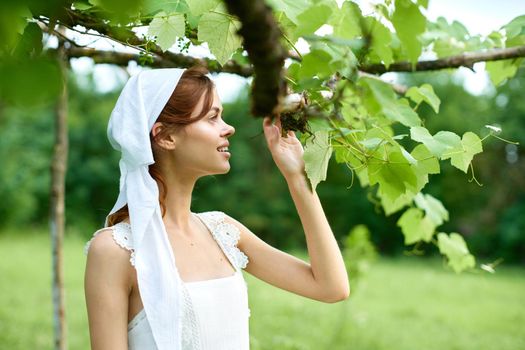 Woman in white dress countryside village nature ecology. High quality photo