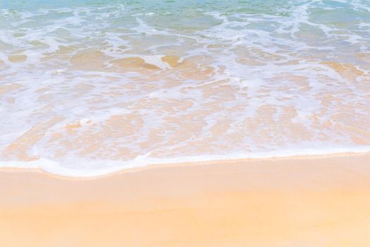 Close up beautiful sea wave on tropical sand beach in summer background