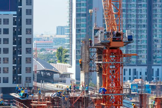 Construction site busy operate in beginning of building new complex infrastructure project.