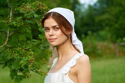 woman outdoors in garden countryside ecology nature. High quality photo