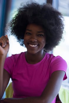 portrait of cute african american woman with afro hairstyle