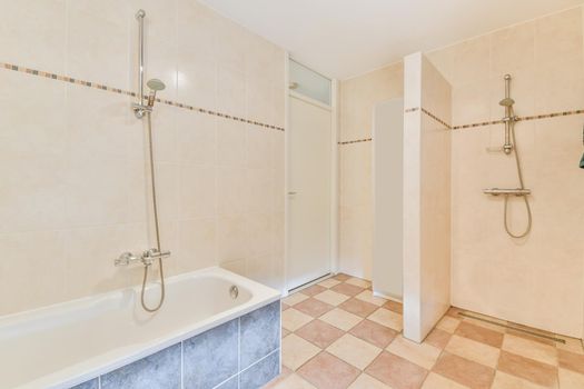 Lovely bathroom with tiled floors and a comfortable bathtub