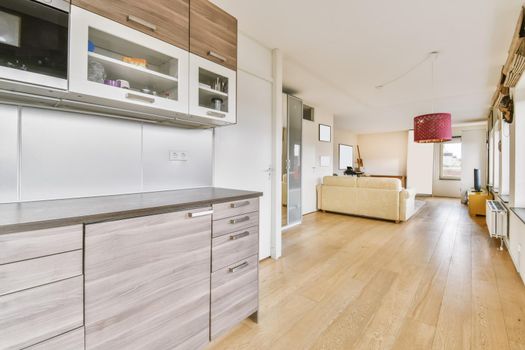 Lovely room with dark wood cabinets and parquet flooring
