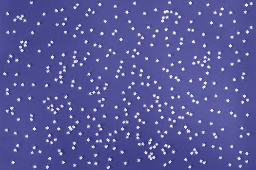 Festive light violet blue background with many snowflakes. Christmas, New Year, Birthday concept. Color of the year 2022. Backdrop for banner or web design. Backplate for happy holidays presentation