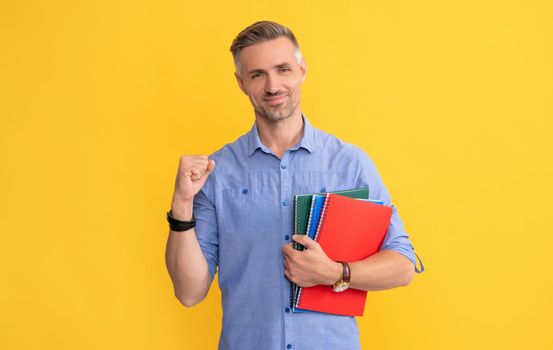 happy successful man hold school notebook or planner, university.