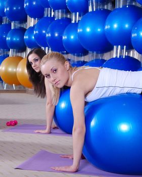 beautifull young girls working out in a gym