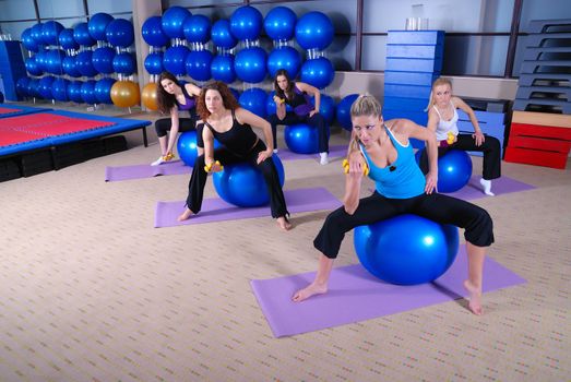 beautifull young girls working out in a gym