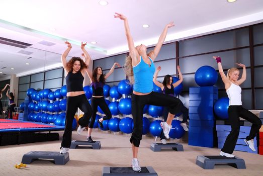 group of girls stepping in a fitness club