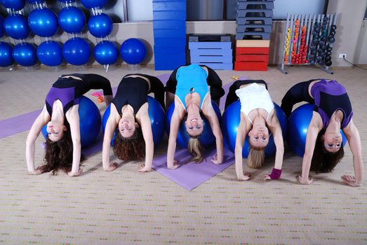 beautifull young girls working out in a gym