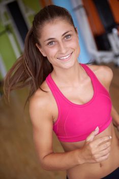 sport, fitness, lifestyle, technology and people concept - smiling woman exercising on treadmill in gym