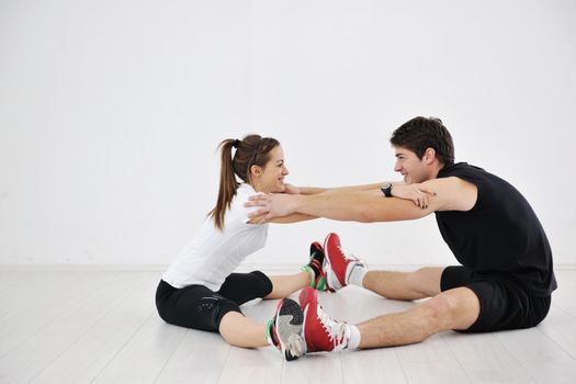 happy young people group in excercise and relax in  fitness club