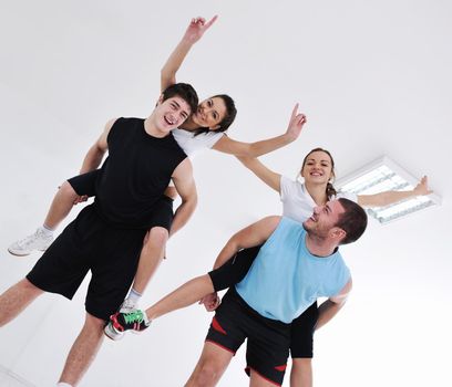 happy young people group in excercise and relax in  fitness club