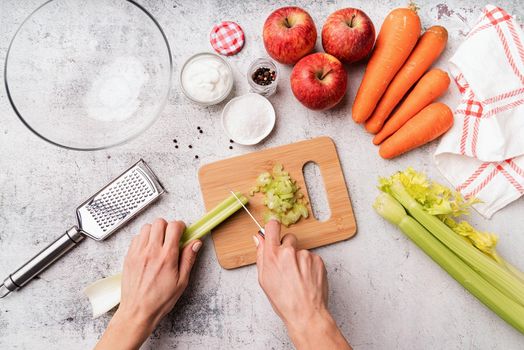 Making diet celery salad, step by step instruction. Step 2 - cutting celery