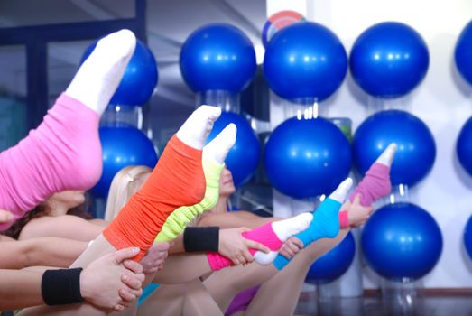 fitness exercise with girls and colorful socks in focus