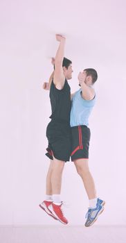 two young adults exercise fitness jumping and relaxing at sport gym club