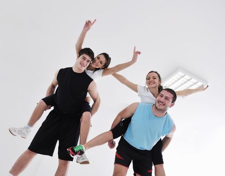 happy young people group in excercise and relax in  fitness club