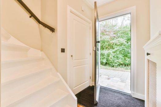 Open front door to the street in elegant house
