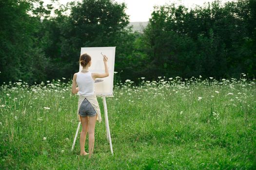 woman artist drawing nature picnic hobby creative. High quality photo