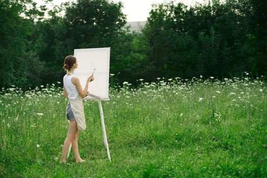 woman artist drawing nature picnic hobby creative. High quality photo