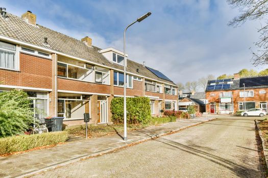 Cozy and attractive street with two-storey brick houses