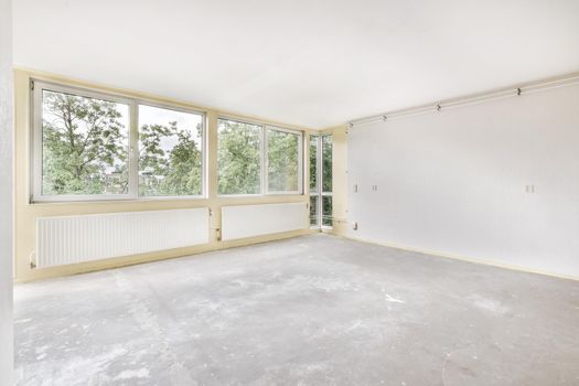 Spacious bright room with a wall-to-wall window