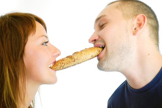 happy couple eating croissant