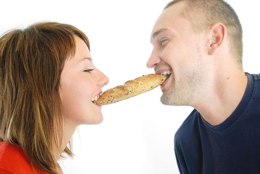 happy couple eating croissant