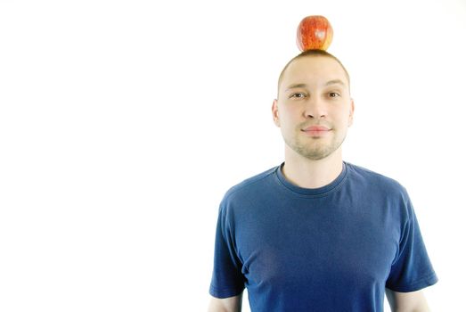 man with apple on head