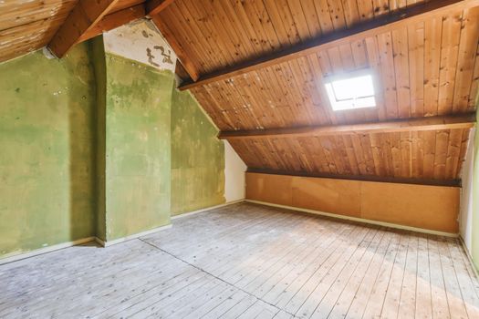 Nice and quirky attic room with wooden ceiling