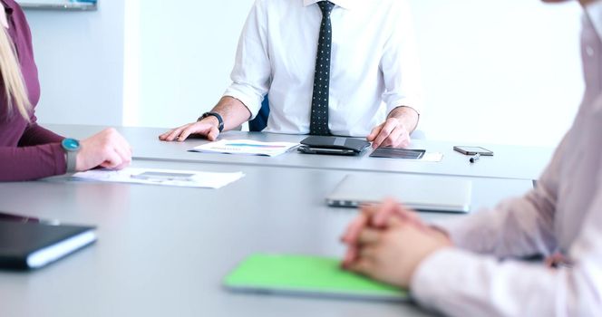 business people having meeting in bright office making plans for business