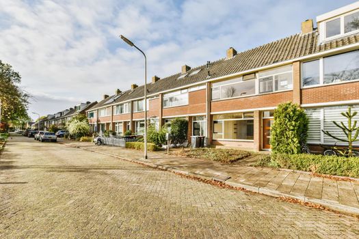 Cozy and attractive street with two-storey brick houses