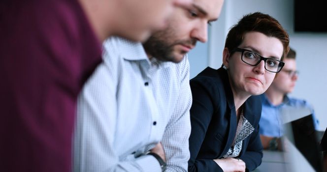 Group of business people discussing business plan  in the office