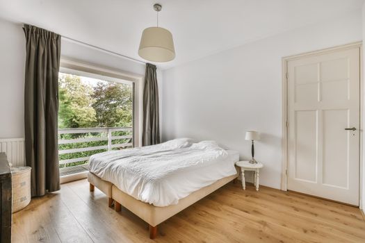 Beautiful bedroom in new luxury home with large bed