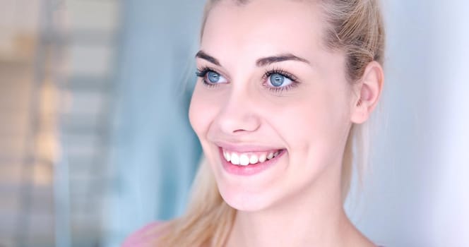 close-up portrait of a beautiful young blond woman